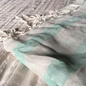Turquoise and white scarf